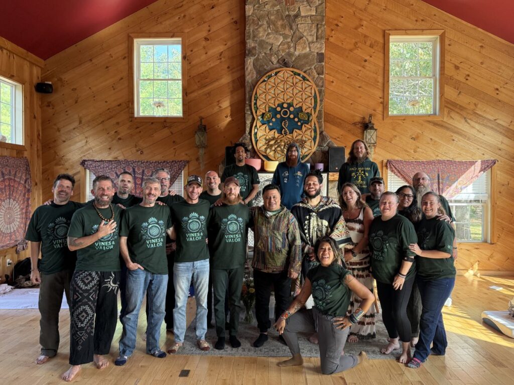 This image features a group of people at a wellness retreat, likely focusing on spiritual or alternative healing practices