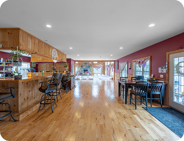 The venue offers multi-day retreats, featuring comforts like a warm fireplace and natural light.